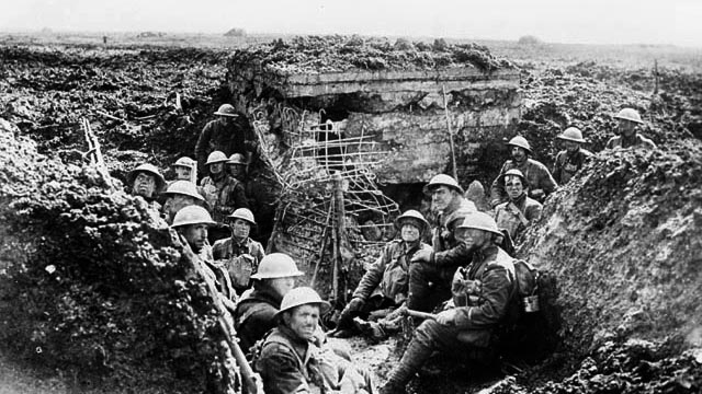 A machine gun emplacement on the crest of Vimy Ridge and the men who drove the Germans from it during the Battle of Vimy Ridge, April 1917. 